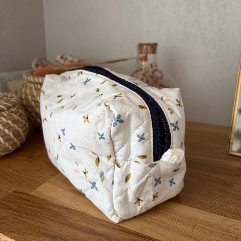 trousse à fleurs blanc
